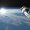 Astronaut or cosmonaut flying upon earth when sun rises, 3d render - Elements of this image furnished by NASA