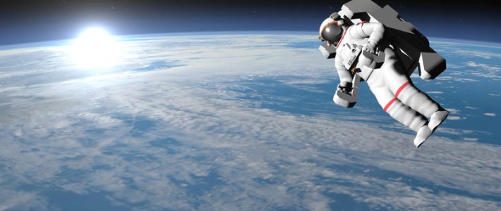 Astronaut or cosmonaut flying upon earth when sun rises, 3d render - Elements of this image furnished by NASA
